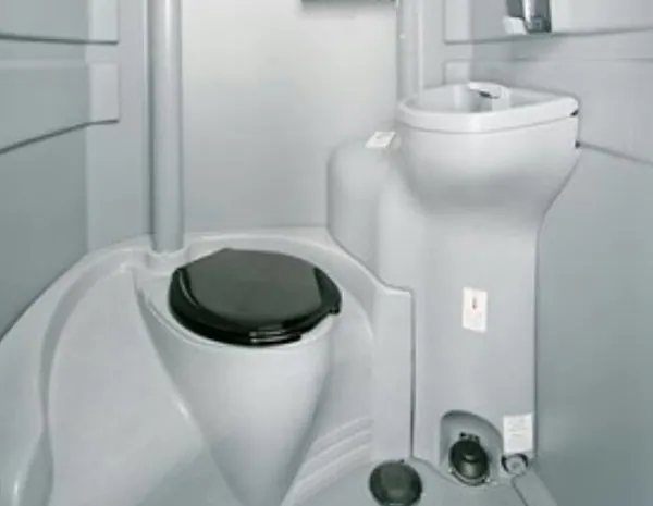 Clean interior of a Royal Throne Room portable restroom unit